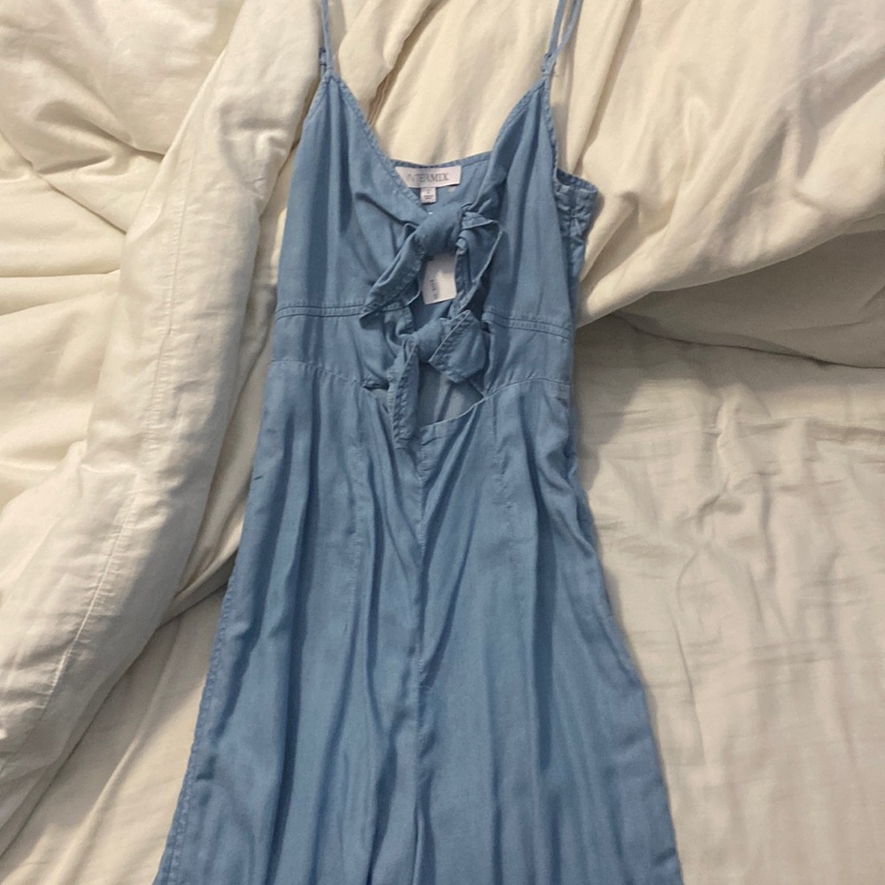 Intermix denim jumpsuit. Size 2. Never worn